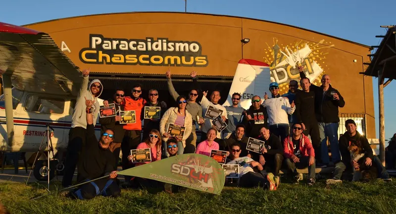 End-of-course group of canopy students at a dropzone in Argentina