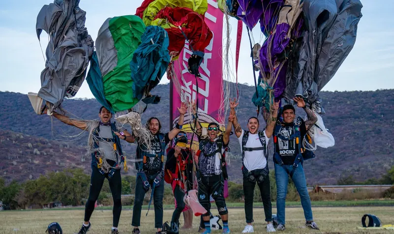 Canopy coaching group celebrating under their canopies in Mexico